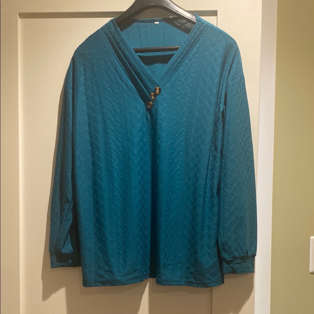 Teal V-Neck woman’s long sleeved blouse. Size L